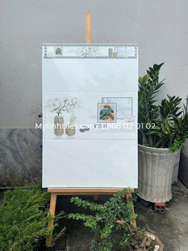 Gạch 30x60 men bóng màu trắng họa tiết hoa lan